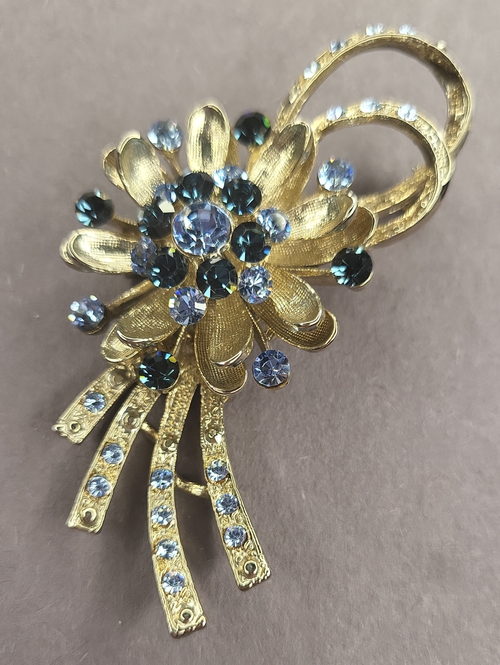 Vintage Gold Flower Brooch with Blue Crystals